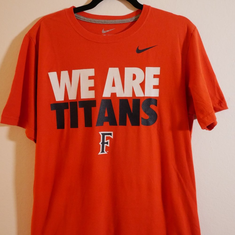 NIKE CSUF "WE ARE TITANS" OFFICIALLY LICENSED LARGE ORANGE COTTON T SHIRT